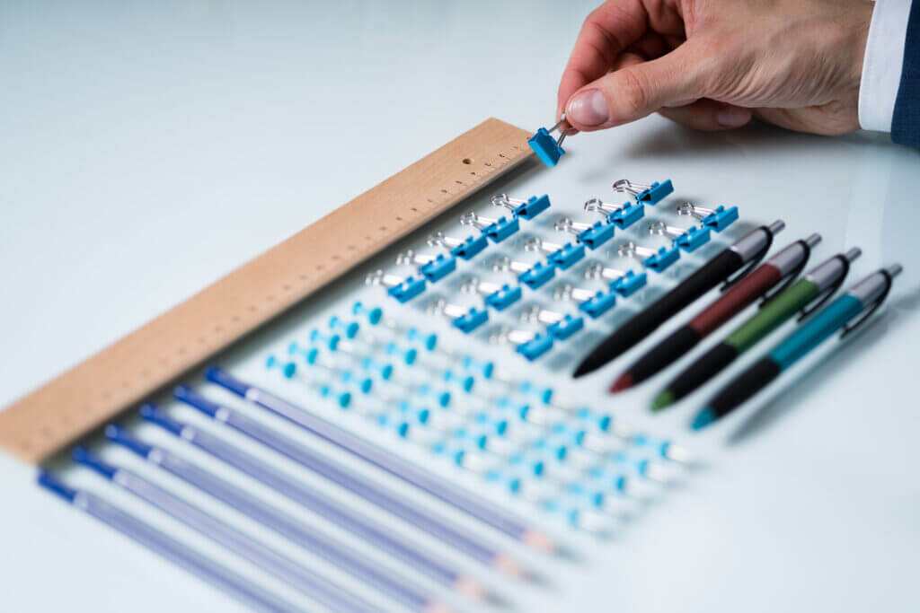 Person Arranging The Clips With Scale