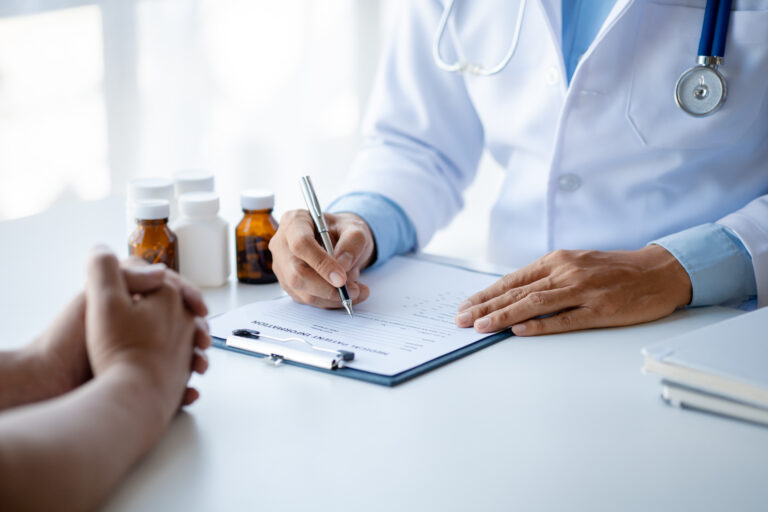 Doctor Prescribing medication to a Patient