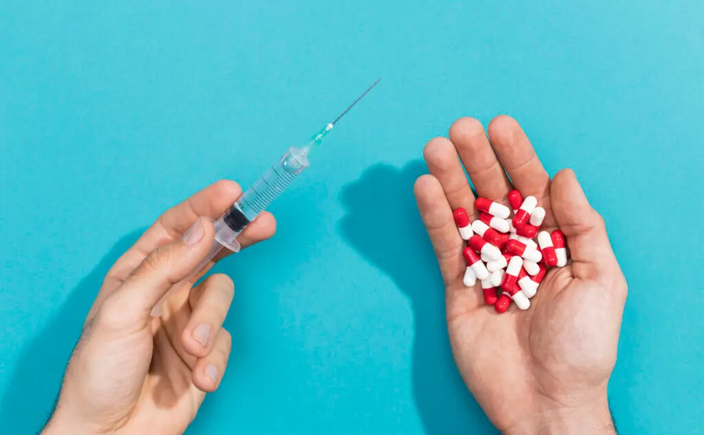 MindWell Suboxone Pills and syringe in hands