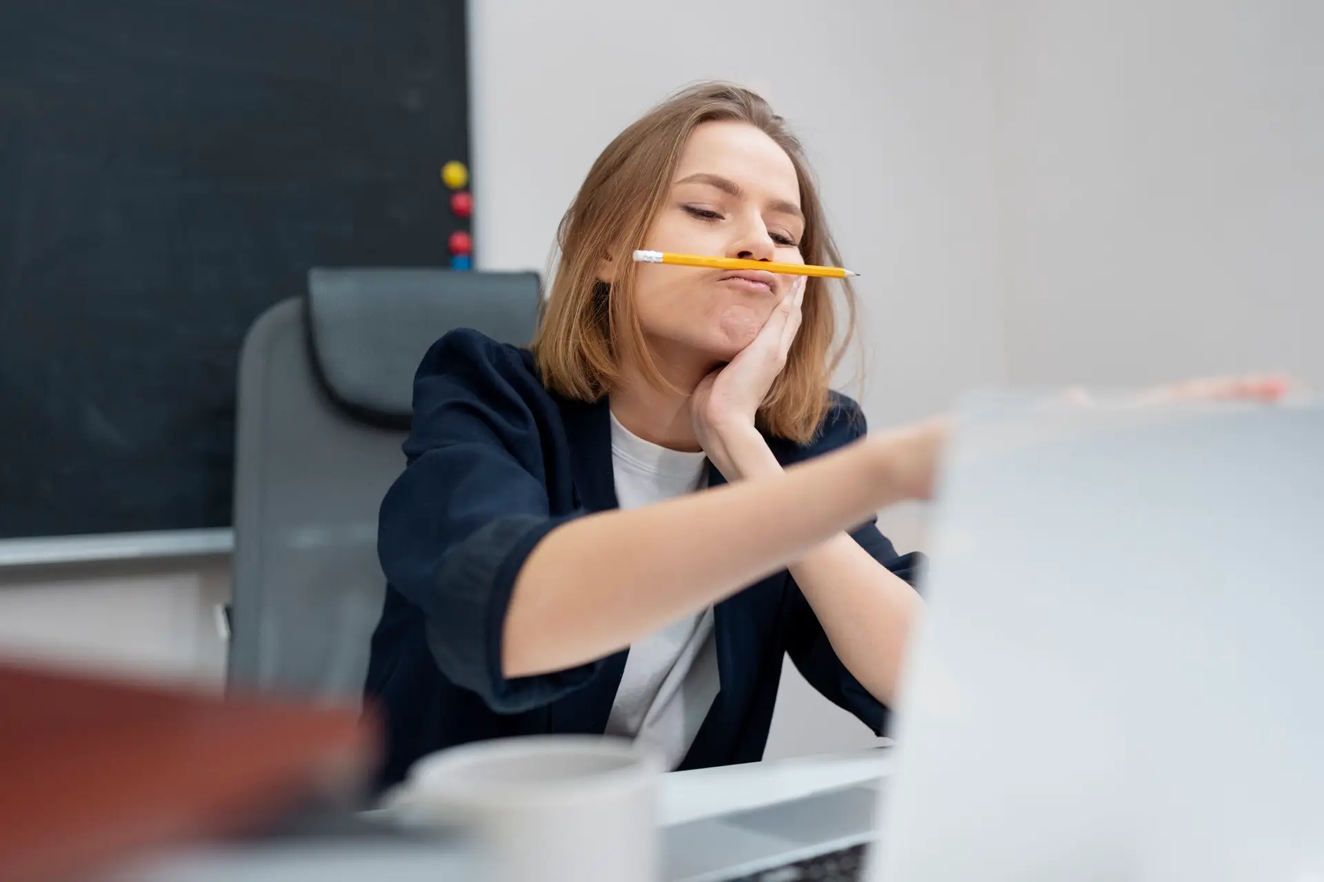 Distracted woman with ADHD in an office