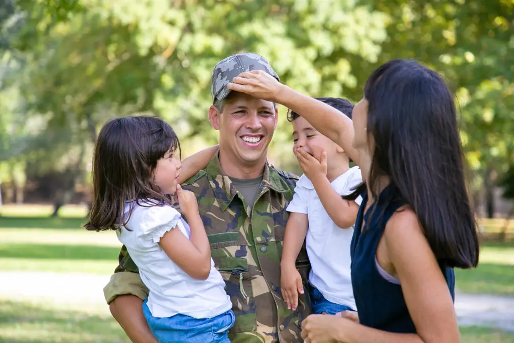 Veteran father with PTSD spending time with family after receiving psychiatric treatment from MindWell in Las Vegas