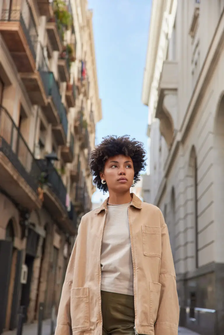 Woman with ADHD looking at buildings near Las Vegas after receiving psychiatric treatment at MindWell