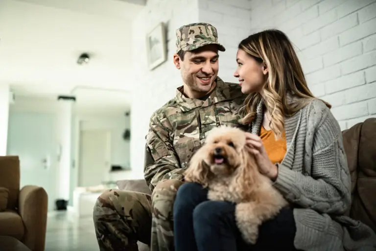 wife and husband and dog sitting on couch in las vegas considering if spouses can get vicarious ptsd