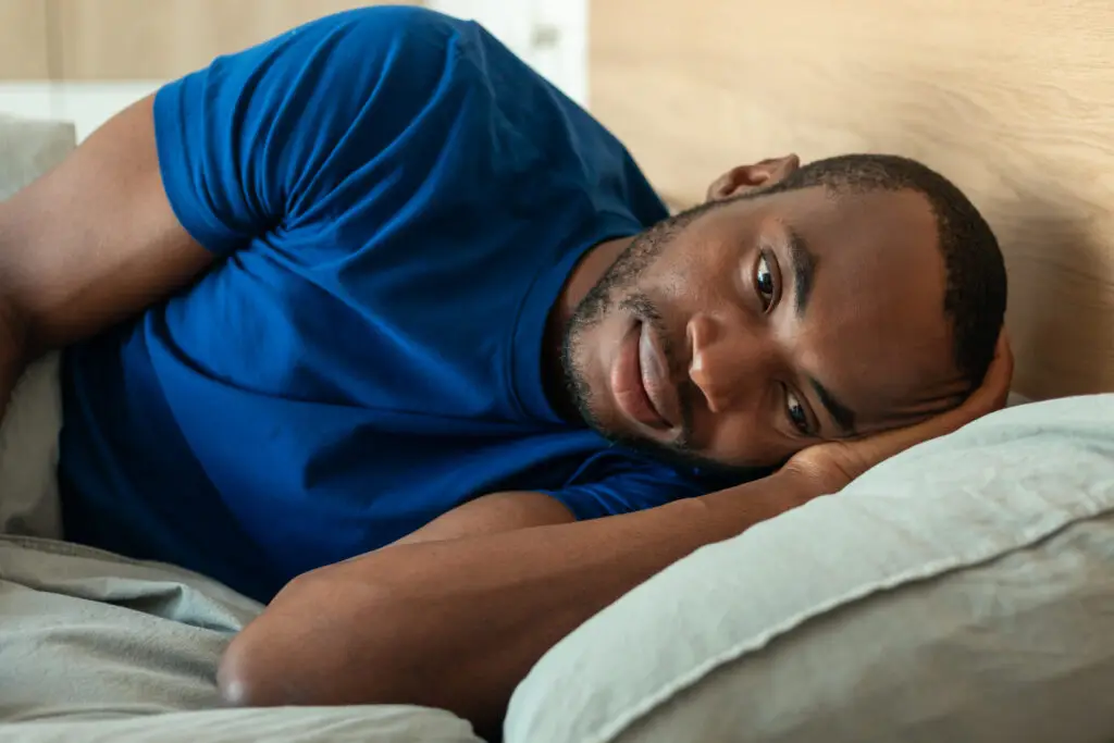 veteran laying in bed with eyes open due to sleep disorder from combat in las vegas
