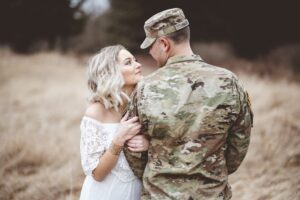 military wife hugging shoulder feeling anxious before he is deployed in las vegas