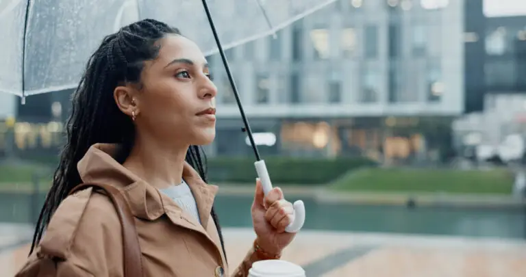 woman outside in the rain of las vegas wondering if her grief has turned into depression