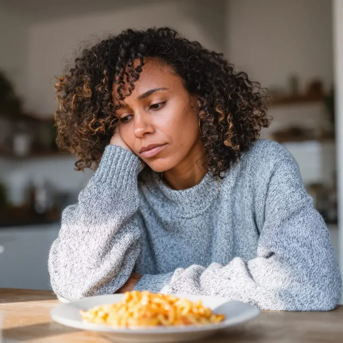 woman feeling guilty after eating in las vegas needing to go to mindwell psychiatric services